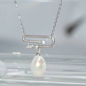 SL00987þCOLLIER CLIP PERLE BROSSE