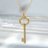 RI01065þCOLLIER CLÉF DORE