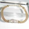 SX01264þBracelet Axis Lien Equilibre Dore