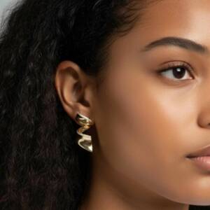 boucle torsade miroir pave doré